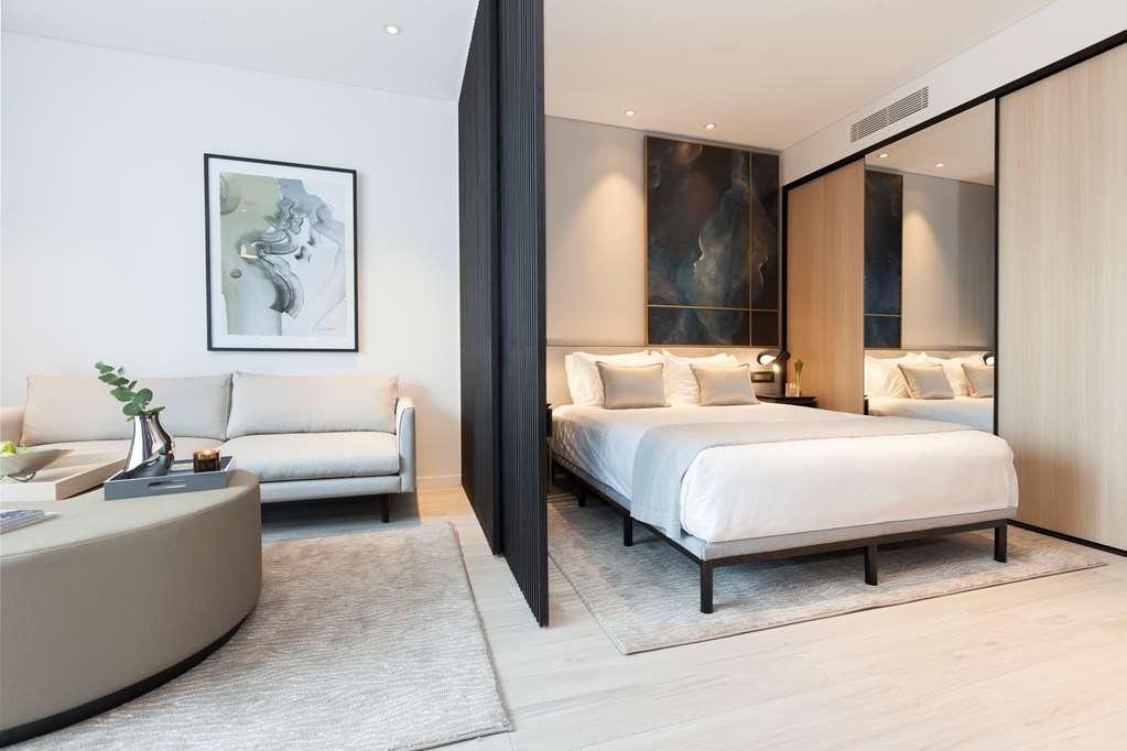 One Global Resorts Green Square Sydney Cameră foto A bedroom at the hotel